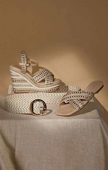 Foto de zapatos studio f para mujer, entre ellos: sandalia plana en color beige y sandalia plataforma
