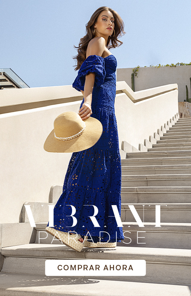 Foto de modelo usando vestido largo en hoja rota azul klein y sombrero para mujer color beige